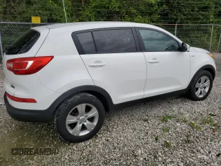 2013 Kia Sportage LX with VIN KNDPBCA20D7501980, listed as a Copart auction lot 61784015 with 140,793 mi miles and Salvage title. Bid and sale history available at DreamBid. Image 3.