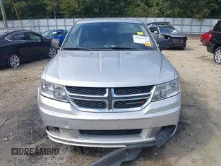 2014 Dodge Journey SE with VIN 3C4PDCAB7ET268221, listed as a IAAI auction lot 40262445 with 153,490 mi miles and . Bid and sale history available at carsss.com. Image 12.