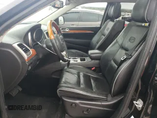 2013 Jeep Grand Cherokee Overland with VIN 1C4RJECG5DC528650, listed as a Copart auction lot 51581684 with 141,050 mi miles and Clean Title. Bid and sale history available at carsss.com. Image 7.