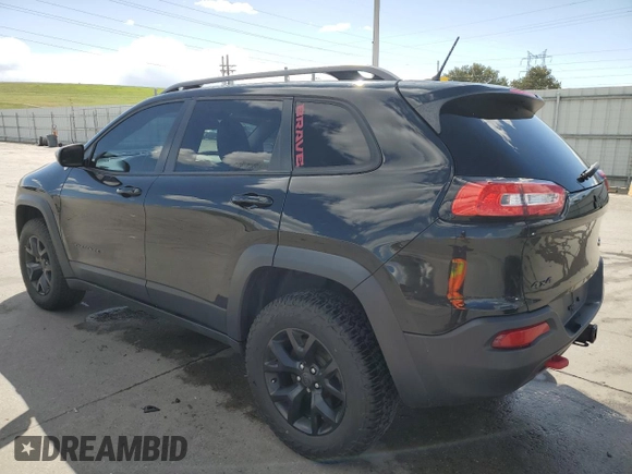 2014 Jeep Cherokee Trailhawk z VIN 1C4PJMBS1EW239692, wystawiony jako Copart lot #57153065 z przebiegiem 111 899 mil mil oraz Szkoda całkowita • Salvage title. Historia ofert i sprzedaży dostępna na DreamBid. Obrazek 2.