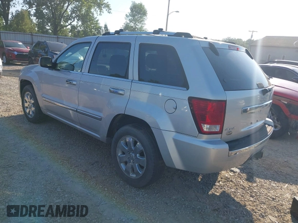 2008 Jeep Grand Cherokee Overland with VIN 1J8HR68M68C242958, listed as a IAAI auction lot 42820206 with 214,472 mi miles and . Bid and sale history available at DreamBid. Image 3.