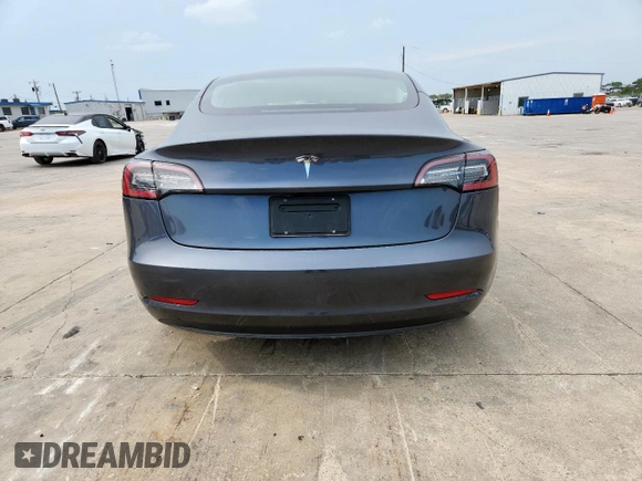 2023 Tesla Model 3 with VIN 5YJ3E1EA1PF468627, listed as a Copart auction lot 57285575 with 5,952 mi miles and Salvage title. Bid and sale history available at DreamBid. Image 6.