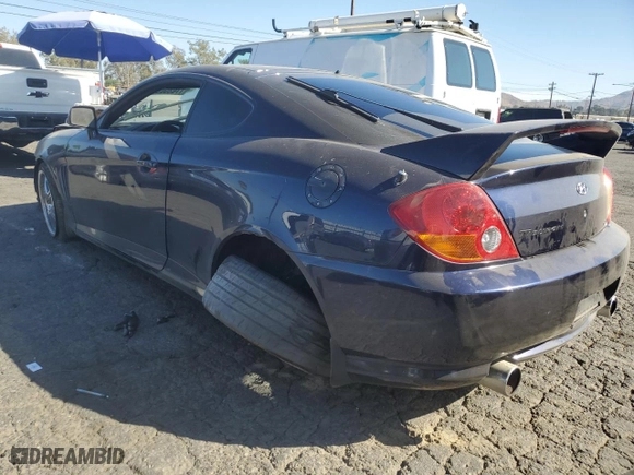 2004 Hyundai Tiburon GT with VIN KMHHN65FX4U108253, listed as a Copart auction lot 77635034 with 34,170 mi miles and Salvage Title. Bid and sale history available at carsss.com. Image 2.