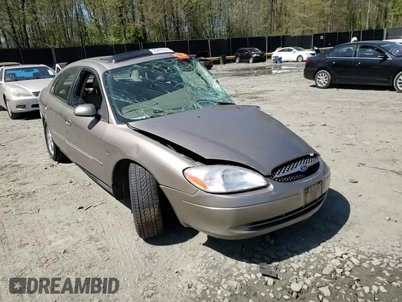 2003 Ford Taurus SEL Deluxe with VIN 1FAHP56SX3G199970, listed as a Copart auction lot 53042795 with 212,802 mi miles and Salvage Title. Bid and sale history available at DreamBid. Image 10.