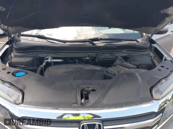 2018 Honda Pilot EX-L with VIN 5FNYF5H56JB003955, listed as a IAAI auction lot 42732433 with 116,613 mi miles and . Bid and sale history available at DreamBid. Image 10.