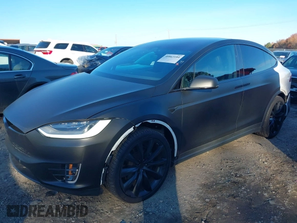 2020 Tesla Model X Long Range with VIN 5YJXCDE28LF298553, listed as a IAAI auction lot 40863184 with 54,031 mi miles and . Bid and sale history available at DreamBid. Image 19.