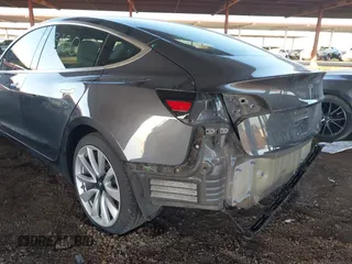 2018 Tesla Model 3 Long Range Battery with VIN 5YJ3E1EA3JF169132, listed as a IAAI auction lot 41678383 with 170,809 mi miles and . Bid and sale history available at DreamBid. Image 6.