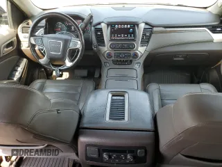 2018 GMC Yukon Denali with VIN 1GKS2CKJXJR217857, listed as a Copart auction lot 62943934 with 122,015 mi miles and Salvage Title. Bid and sale history available at carsss.com. Image 8.