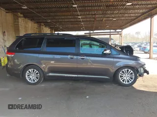 2014 Toyota Sienna XLE with VIN 5TDYK3DC5ES433949, listed as a IAAI auction lot 42095625 with 337,642 mi miles and . Bid and sale history available at DreamBid. Image 14.