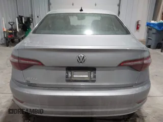 2020 Volkswagen Jetta SEL z VIN 3VWE57BU0LM087350, wystawiony jako IAAI lot #41581637 z przebiegiem 60 528 mil mil oraz . Historia ofert i sprzedaży dostępna na DreamBid. Obrazek 16.