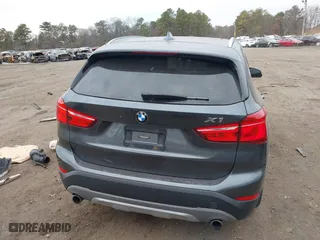 2017 BMW X1 xDrive28i with VIN WBXHT3C37H5F86637, listed as a IAAI auction lot 41300161 with 95,459 mi miles. Bid and sale history available at carsss.com. Image 16.