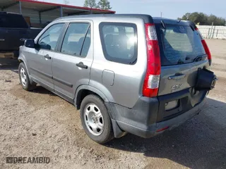 2006 Honda CR-V LX with VIN JHLRD68586C024863, listed as a IAAI auction lot 41569505 with 210,624 mi miles. Bid and sale history available at carsss.com. Image 3.