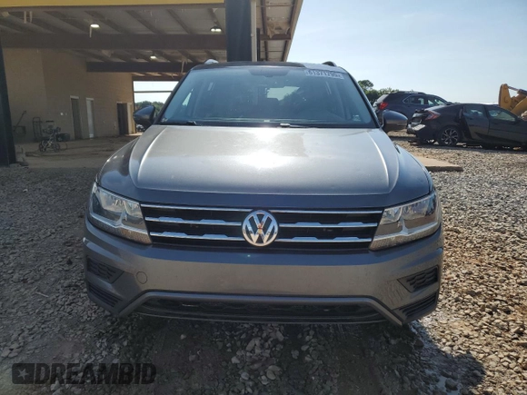 2021 Volkswagen Tiguan SE with VIN 3VV3B7AX6MM078802, listed as a Copart auction lot 61371795 with 69,967 mi miles and Salvage title. Bid and sale history available at DreamBid. Image 5.