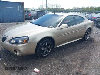 2004 Pontiac Grand Prix GTP with VIN 2G2WR524941282246, listed as a IAAI auction lot 42068954 with 292,925 mi miles. Bid and sale history available at carsss.com. Image 2.