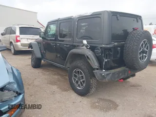 2024 Jeep Wrangler Rubicon with VIN 1C4PJXFG6RW337596, listed as a IAAI auction lot 41958788 with 15,942 mi miles and . Bid and sale history available at DreamBid. Image 3.