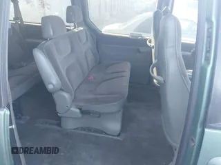 1999 Plymouth Voyager Grand SE z VIN 2P4GP44G1XR180660, wystawiony jako IAAI lot #42149571 z przebiegiem Nie podano mil oraz . Historia ofert i sprzedaży dostępna na DreamBid. Obrazek 8.