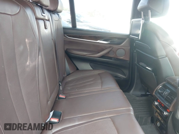 2016 BMW X5 sDrive35i with VIN 5UXKR2C51G0U17086, listed as a IAAI auction lot 41782636 with 100,791 mi miles. Bid and sale history available at carsss.com. Image 8.