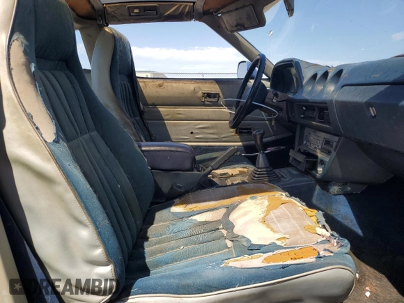 1981 Datsun 280ZX z VIN JN1HZ04S2BX268405, wystawiony jako Copart lot #65626714 z przebiegiem 94 507 mil mil oraz Tytuł czysty. Historia ofert i sprzedaży dostępna na DreamBid. Obrazek 10.