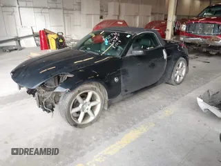 2005 Nissan 350Z Touring z VIN JN1AZ36A15M758086, wystawiony jako IAAI lot #41473598 z przebiegiem 90 799 mil mil oraz . Historia ofert i sprzedaży dostępna na DreamBid. Obrazek 2.