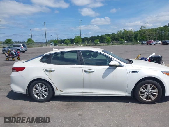 2016 Kia Optima LX z VIN KNAGT4L3XG5095972, wystawiony jako IAAI lot #42130422 z przebiegiem 103 420 mil mil oraz . Historia ofert i sprzedaży dostępna na DreamBid. Obrazek 13.