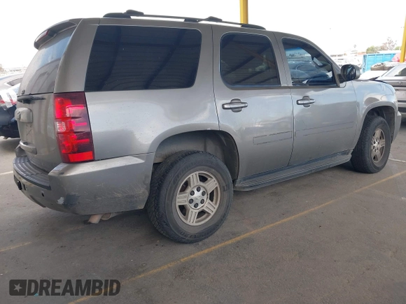 2007 Chevrolet Tahoe LS with VIN 1GNFC13C97R278535, listed as a IAAI auction lot 42008667 with 175,671 mi miles and . Bid and sale history available at DreamBid. Image 4.
