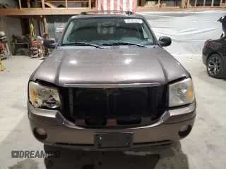 2008 GMC Envoy SLE2 with VIN 1GKDS13S482236329, listed as a Copart auction lot 87001674 with 150,807 mi miles and Salvage Title. Bid and sale history available at carsss.com. Image 5.
