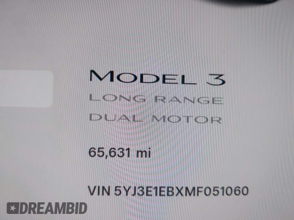 2021 Tesla Model 3 Long Range with VIN 5YJ3E1EBXMF051060, listed as a IAAI auction lot 41958018 with 65,631 mi miles. Bid and sale history available at carsss.com. Image 15.