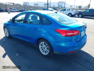 2017 Ford Focus SE with VIN 1FADP3F21HL246837, listed as a IAAI auction lot 41696492 with 84,124 mi miles. Bid and sale history available at carsss.com. Image 3.