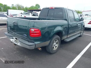 2002 Ford F-150 XLT with VIN 1FTRW07L82KB04538, listed as a IAAI auction lot 42104767 with Not Provided miles and . Bid and sale history available at DreamBid. Image 4.