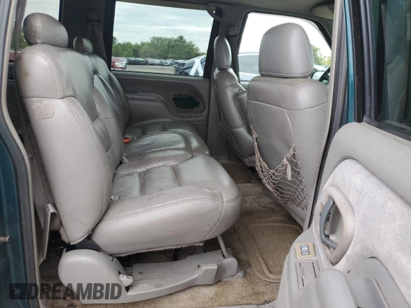 1999 Chevrolet Suburban with VIN 1GNFK16R9XJ516000, listed as a Copart auction lot 73854994 with 263,079 mi miles and Salvage Title. Bid and sale history available at carsss.com. Image 10.