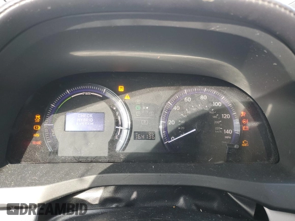 2010 Lexus HS 250h with VIN JTHBB1BA0A2026729, listed as a Copart auction lot 85671574 with 164,136 mi miles and Salvage Title. Bid and sale history available at DreamBid. Image 9.