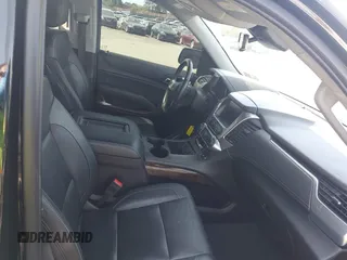 2020 Chevrolet Tahoe LT with VIN 1GNSKBKCXLR255963, listed as a IAAI auction lot 42127845 with 46,746 mi miles and . Bid and sale history available at DreamBid. Image 5.
