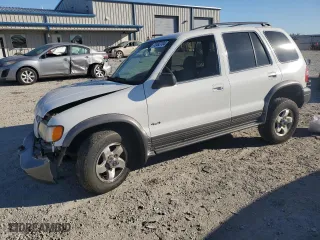 2002 Kia Sportage with VIN KNDJA723625142604, listed as a Copart auction lot 73463704 with 236,260 mi miles and Salvage Title. Bid and sale history available at carsss.com. Image 1.
