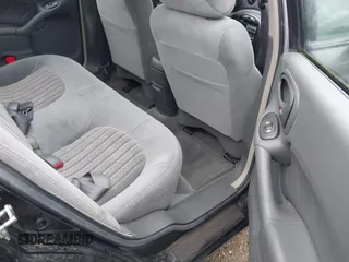 2004 Pontiac Grand Am GT with VIN 1G2NW52E64M677552, listed as a IAAI auction lot 41101595 with 100,644 mi miles. Bid and sale history available at carsss.com. Image 8.
