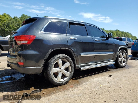 2012 Jeep Grand Cherokee Overland with VIN 1C4RJECTXCC227769, listed as a Copart auction lot 68760174 with 144,537 mi miles and Salvage Title. Bid and sale history available at carsss.com. Image 3.