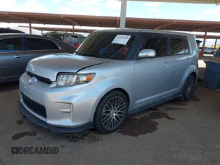 2014 Scion xB z VIN JTLZE4FE7EJ055408, wystawiony jako IAAI lot #42153105 z przebiegiem 122 995 mil mil oraz . Historia ofert i sprzedaży dostępna na DreamBid. Obrazek 2.