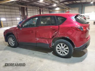 2016 Mazda CX-5 Sport z VIN JM3KE4BY9G0824021, wystawiony jako Copart lot #52392345 z przebiegiem 121 990 mil mil oraz Szkoda całkowita • Salvage title. Historia ofert i sprzedaży dostępna na DreamBid. Obrazek 2.