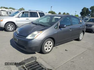 2007 Toyota Prius z VIN JTDKB20U773285807, wystawiony jako Copart lot #61011975 z przebiegiem Nie podano mil oraz Szkoda całkowita • Salvage title. Historia ofert i sprzedaży dostępna na DreamBid. Obrazek 1.