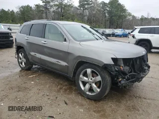 2013 Jeep Grand Cherokee Overland with VIN 1C4RJFCT7DC522416, listed as a Copart auction lot 44614375 with 170,786 mi miles and Salvage Title. Bid and sale history available at carsss.com. Image 4.