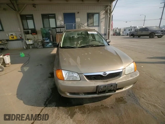 1999 Mazda Protege DX z VIN JM1BJ2223X0137153, wystawiony jako Copart lot #87899735 z przebiegiem 154 209 mil mil oraz Szkoda całkowita • Salvage title. Historia ofert i sprzedaży dostępna na DreamBid. Obrazek 10.