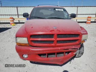 1999 Dodge Durango z VIN 1B4HS28Z1XF528727, wystawiony jako Copart lot #77621824 z przebiegiem 164 880 mil mil oraz Szkoda całkowita • Salvage title. Historia ofert i sprzedaży dostępna na DreamBid. Obrazek 5.