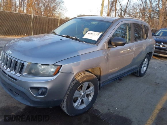 2016 Jeep Compass Sport with VIN 1C4NJCBA1GD743294, listed as a IAAI auction lot 41035177 with 124,379 mi miles. Bid and sale history available at carsss.com. Image 2.