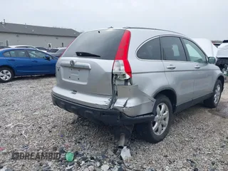 2009 Honda CR-V EX-L with VIN JHLRE487X9C021566, listed as a IAAI auction lot 42008321 with 128,647 mi miles and . Bid and sale history available at carsss.com. Image 6.