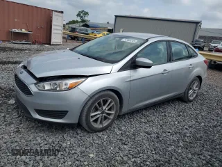 2018 Ford Focus SE z VIN 1FADP3F27JL250591, wystawiony jako Copart lot #54989245 z przebiegiem 85 838 mil mil oraz Szkoda całkowita • Salvage title. Historia ofert i sprzedaży dostępna na DreamBid. Obrazek 1.