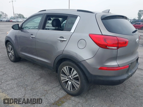 2014 Kia Sportage EX with VIN KNDPC3AC9E7571730, listed as a IAAI auction lot 42164657 with 77,045 mi miles and . Bid and sale history available at DreamBid. Image 3.