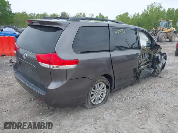 2013 Toyota Sienna XLE AAS with VIN 5TDYK3DC5DS405535, listed as a IAAI auction lot 42348931 with 186,177 mi miles and . Bid and sale history available at DreamBid. Image 4.