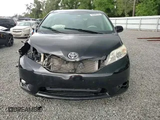 2012 Toyota Sienna XLE AAS with VIN 5TDYK3DC1CS279236, listed as a Copart auction lot 63329165 with 143,937 mi miles and Salvage title. Bid and sale history available at DreamBid. Image 14.