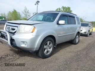 2009 Honda Pilot EX-L with VIN 5FNYF48599B025471, listed as a IAAI auction lot 42133938 with 217,105 mi miles. Bid and sale history available at carsss.com. Image 2.