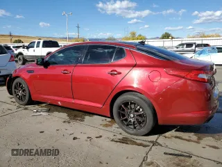 2012 Kia Optima EX with VIN 5XXGN4A68CG027623, listed as a Copart auction lot 77272054 with 112,115 mi miles and Salvage Title. Bid and sale history available at carsss.com. Image 2.