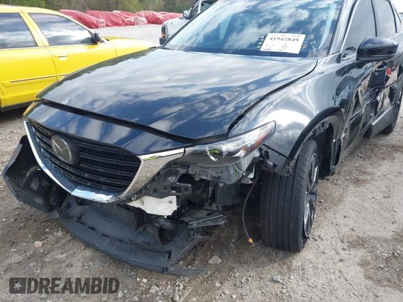 2022 Mazda CX-9 Touring Plus z VIN JM3TCBAYXN0613830, wystawiony jako IAAI lot #41942849 z przebiegiem 50 193 mil mil oraz . Historia ofert i sprzedaży dostępna na DreamBid. Obrazek 20.